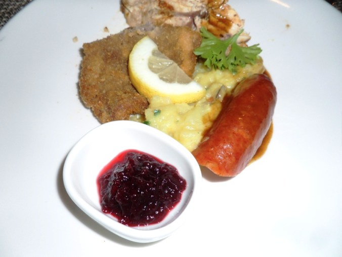 Viking Cruises, Viking Atla, Austrian food, food, foodie, schnitzel, mashed potatoes, sausage, cranberry sauce, Austrian themed, dinner, photography, TS76