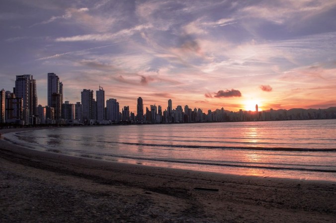 Admire the sunset in Miami Beach, Florida.