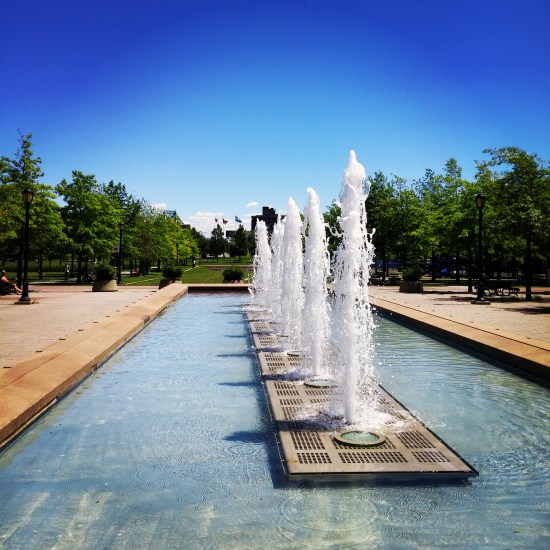Fountains in middle of a park in Montreal.